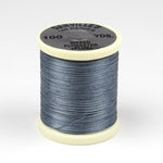 Black 140 Denier Danville thread from Clouser's Fly Shop, showing close-up of spool with tightly wound thread on a white background.