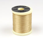 Dark brown 140 Denier Danville thread from Clouser's Fly Shop, showing a close-up of the strong, durable thread spool.