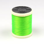 Close-up of 140 Denier Danville thread spool in black, showcasing durable Clouser's Fly Shop fly tying thread for fishing lures.