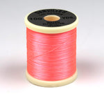 Bright yellow 140 Denier Danville Thread by Clouser's Fly Shop shown on a spool for fly tying and sewing projects.