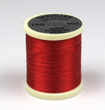Black 140 Denier Danville Thread from Clouser's Fly Shop, showing the spool with tightly wound thread for fly tying.