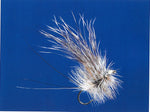 Close-up of Clouser's Drake fly in brown and green, designed for fly fishing, showing detailed feather and hook craftsmanship.