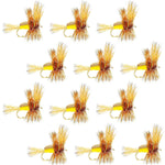Set of 12 yellow Humpy classic trout dry flies with barbless hooks, size 10, designed for fly fishing.