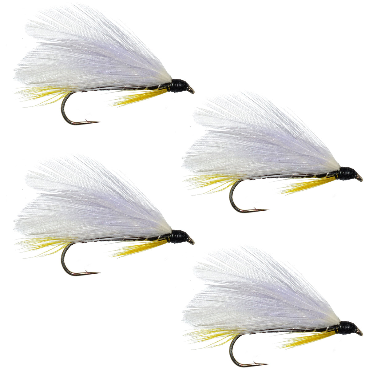 Set of four Black Ghost classic streamer flies for trout fishing, hook size 4, by The Fly Fishing Place, detailed close-up image.