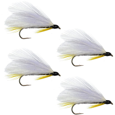 Set of four Black Ghost classic streamer flies for trout fishing, hook size 4, by The Fly Fishing Place, detailed close-up image.