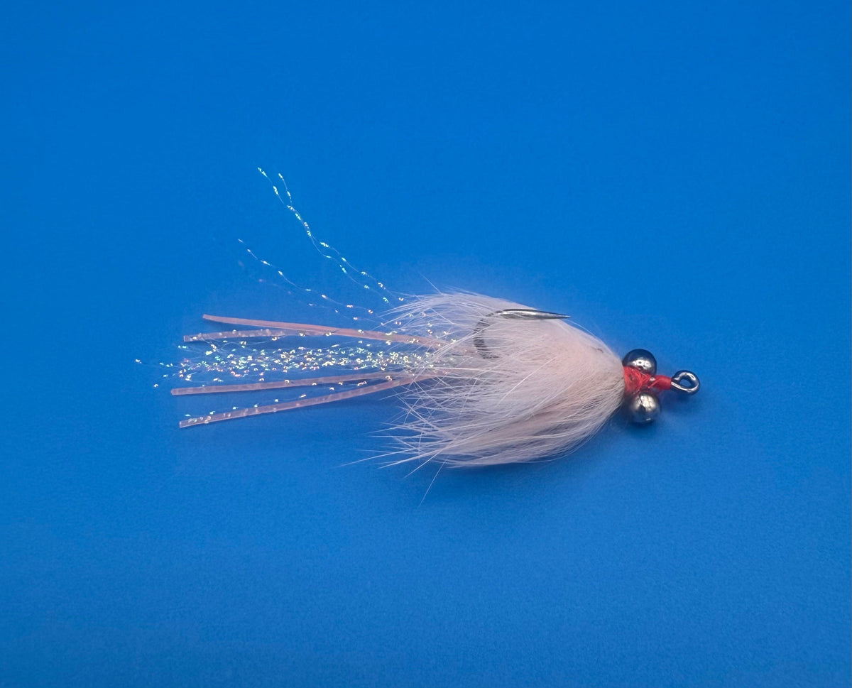 Clouser's Crab Snack, all products display featuring a close-up of the colorful, detailed fishing lure used for fly fishing.