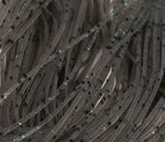 Close-up of Crazy Legs fly tying material by Clouser's Fly Shop, showing vibrant, textured legs for fishing fly creation.