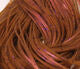 Crazy Legs fly tying material from Clouser's Fly Shop, showing vibrant, textured strands ideal for fly fishing lures.
