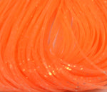 Close-up of Crazy Legs fly tying material from Clouser's Fly Shop, showing vibrant, flexible strands used for fly fishing lures.
