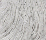 Close-up of Crazy Legs fly tying material from Clouser's Fly Shop, showing iridescent, multi-colored synthetic strands for fly tying.