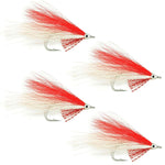 Set of four Lefty's Deceiver saltwater streamer flies in red and white, size 1/0, for fly fishing.