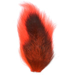 Pro Grade Medium Bucktail for fly tying, in black, red, and orange, with deer tail hair, ideal for streamer fly patterns.