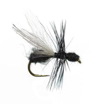 Three barbless black fur flying ant dry flies for trout fishing, size 14, by The Fly Fishing Place, shown on a white background.