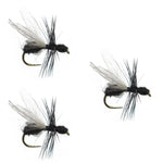 Set of three black fur flying ant dry flies for trout fishing, size 18, by The Fly Fishing Place, featuring barbless hooks.