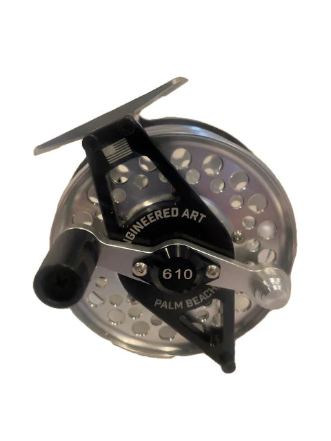 Clouser's Fly Shop Old Mariner Inshore Series 610 fishing reel with stainless steel components and ergonomic handle.