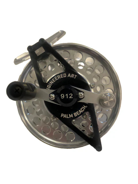 Clouser's Fly Shop Old Mariner Inshore Series 912 fishing reel with metal body and handle, designed for saltwater fishing.