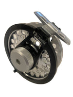 Close-up of Clouser's Fly Shop Old Mariner Inshore Series 610 fishing reel with handle and spool in detailed view.