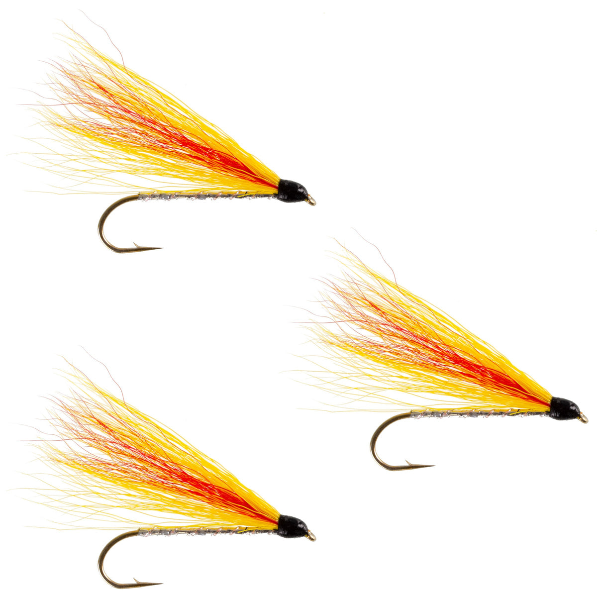 Three Mickey Finn Classic streamer flies for trout fishing, hook size 4, from The Fly Fishing Place, featuring vibrant feather and fur patterns.