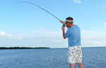 Saltwater Clousers Deep Minnow Blue and White streamer fly, size 1/0, designed for saltwater fly fishing, featuring detailed feather and threadwork.
