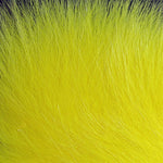 Arctic Fox hair fly tying material from Clouser's Fly Shop, showing soft, vibrant orange and white fur for fishing lures.