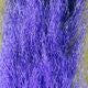 Clouser's Fly Shop calf tail used as fly tying material, showing natural hair and coloration for fishing lures.