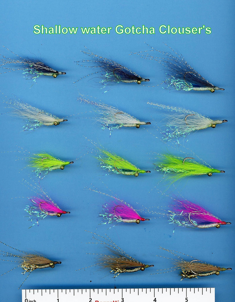 Close-up of Gotcha Clousers fishing flies by Clouser's Fly Shop, showcasing their colorful feather and hook design for fly fishing.