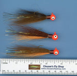 Three Clouser's Fly Shop bucktail jig lures with painted heads and eyes, 1/4 oz, designed for fishing.