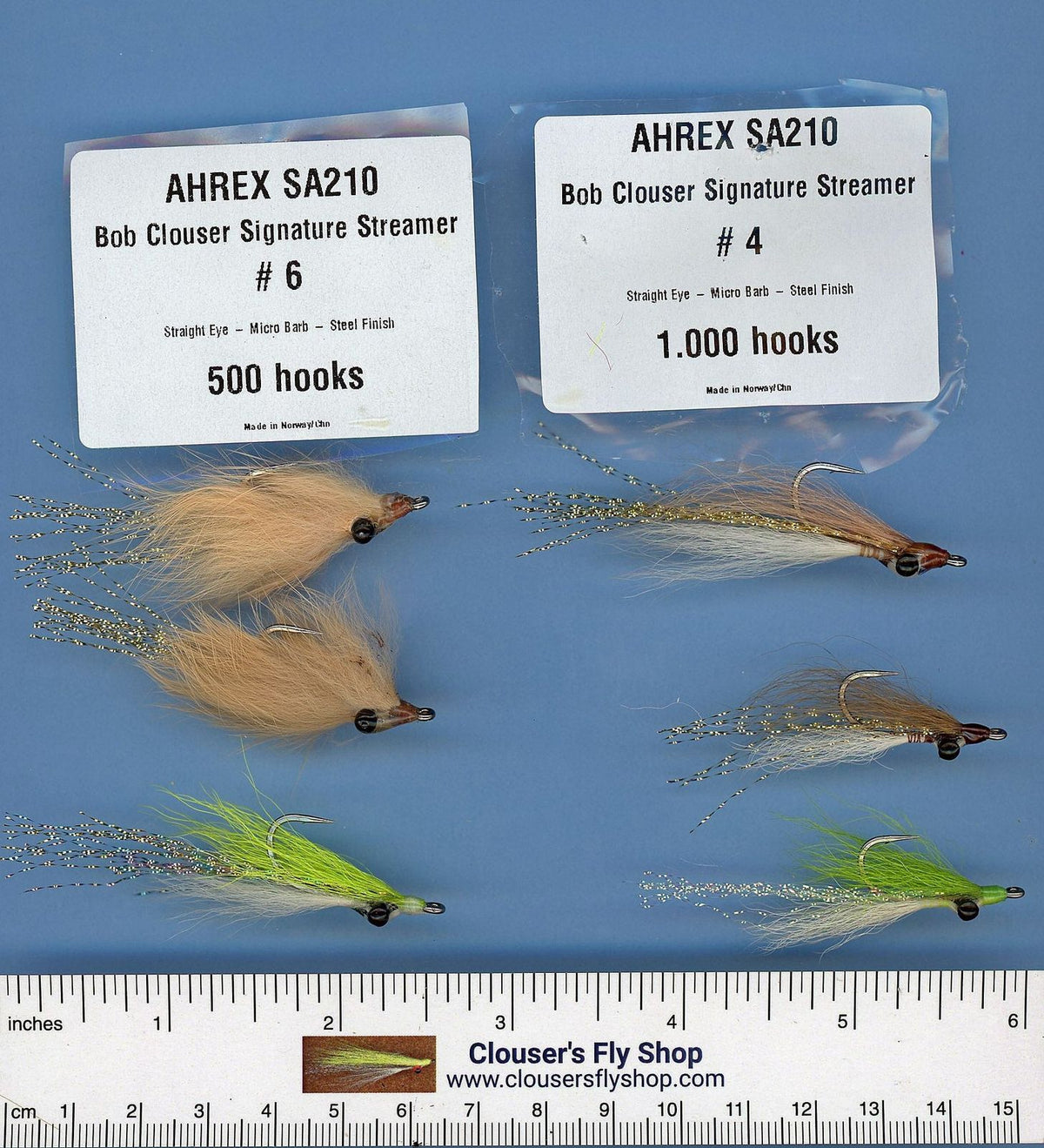 Assortment of Clouser's Fly Shop fishing flies, including Clouser's JP Crosscut Minnow and Clouser Deep Minnow, with hooks an