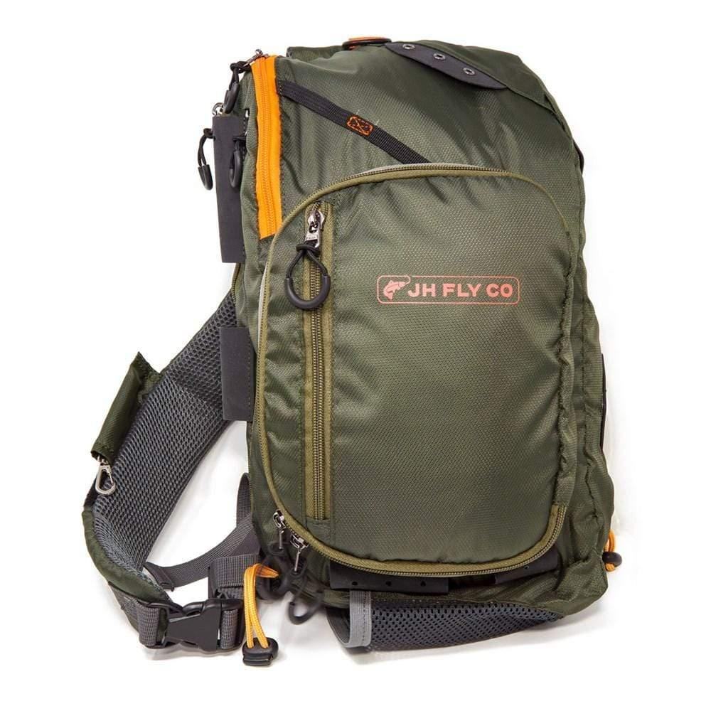 Jackson Hole Fly Company 13L adjustable sling pack designed for fishing, featuring multiple compartments and comfortable straps.