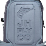 Jackson Hole Fly Company waterproof fishing backpack, 27L capacity with multiple compartments for gear storage.