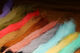 Close-up of a calf tail fly tying material from Clouser's Fly Shop, showing soft, natural calf hair for fishing lures.